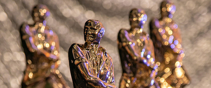 Gold SIR Award statues